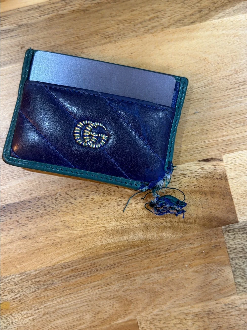 Gucci Navy Leather Card Holder with Green Trim and Gold Emblem (damaged).